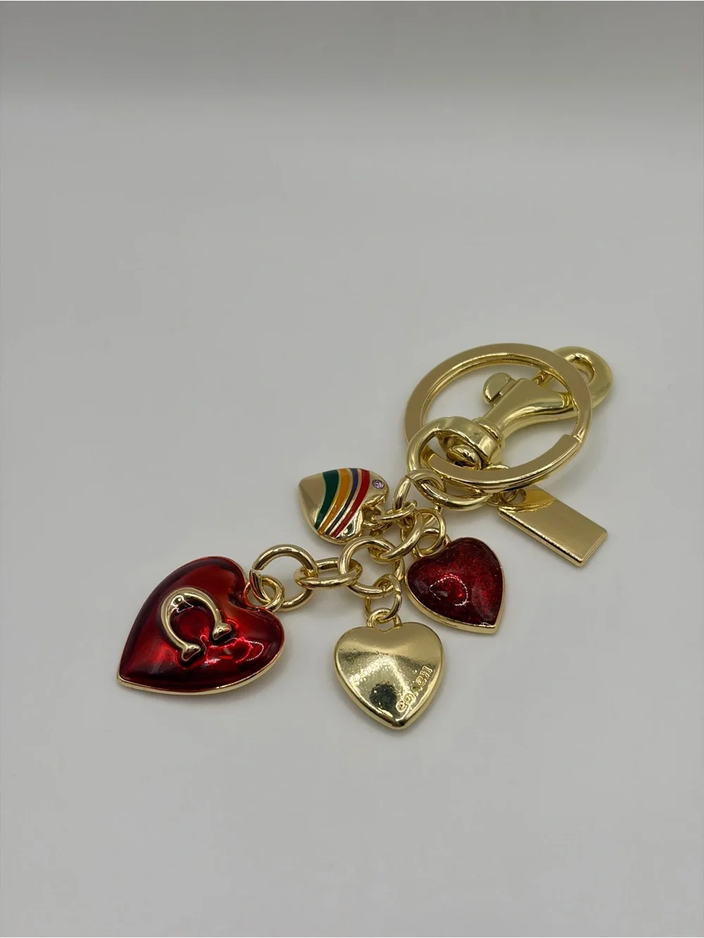 Trendy Gold-tone Heart Charm Keychain with Red Enamel Hearts